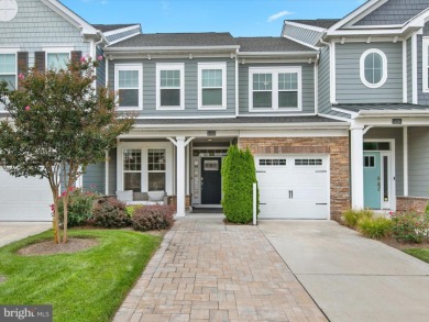Welcome to 24262 Canoe Drive, an exquisite townhome villa on The Peninsula Golf and Country Club in Delaware - for sale on GolfHomes.com, golf home, golf lot