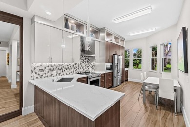 Step into this beautiful remodeled condo, where natural light on Polo Club of Boca Raton in Florida - for sale on GolfHomes.com, golf home, golf lot