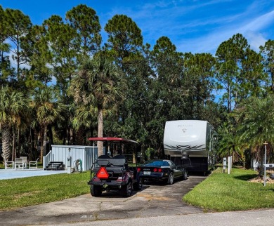 Located in an exclusive gated community with a championship on The Great Outdoors Golf and Country Club in Florida - for sale on GolfHomes.com, golf home, golf lot