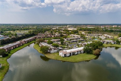 Lovely condo in a gated, golf course community!! This updated on East Lake Woodlands Country Club in Florida - for sale on GolfHomes.com, golf home, golf lot