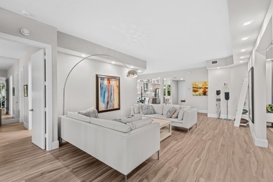 Step into this beautiful remodeled condo, where natural light on Polo Club of Boca Raton in Florida - for sale on GolfHomes.com, golf home, golf lot