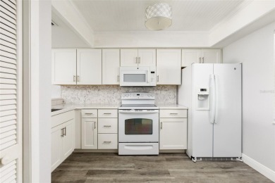 Lovely condo in a gated, golf course community!! This updated on East Lake Woodlands Country Club in Florida - for sale on GolfHomes.com, golf home, golf lot