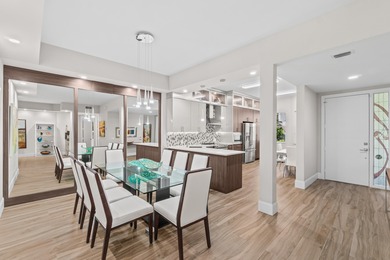 Step into this beautiful remodeled condo, where natural light on Polo Club of Boca Raton in Florida - for sale on GolfHomes.com, golf home, golf lot