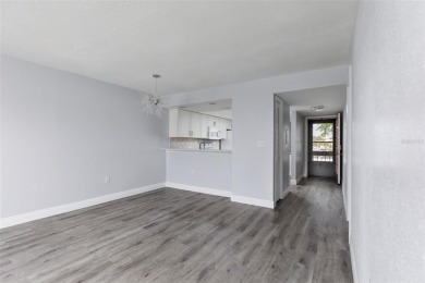 Lovely condo in a gated, golf course community!! This updated on East Lake Woodlands Country Club in Florida - for sale on GolfHomes.com, golf home, golf lot