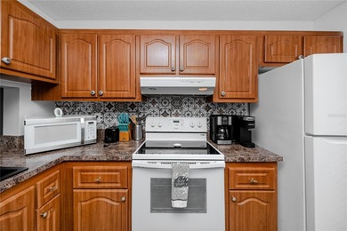 Welcome to life on Isla Del Sol, where island serenity meets on Isla Del Sol Yacht and Country Club in Florida - for sale on GolfHomes.com, golf home, golf lot