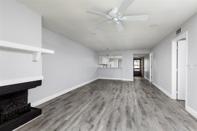 Lovely condo in a gated, golf course community!! This updated on East Lake Woodlands Country Club in Florida - for sale on GolfHomes.com, golf home, golf lot