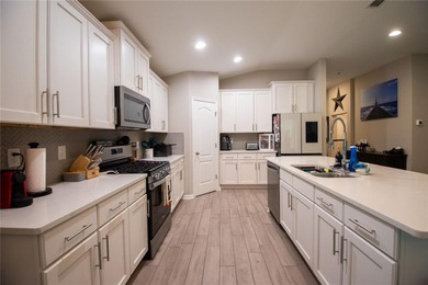 Beautifully maintained 4-bedroom, 3-bathroom home located in the on The Club At Osprey Cove in Georgia - for sale on GolfHomes.com, golf home, golf lot