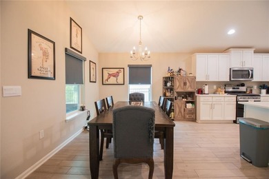 Beautifully maintained 4-bedroom, 3-bathroom home located in the on The Club At Osprey Cove in Georgia - for sale on GolfHomes.com, golf home, golf lot