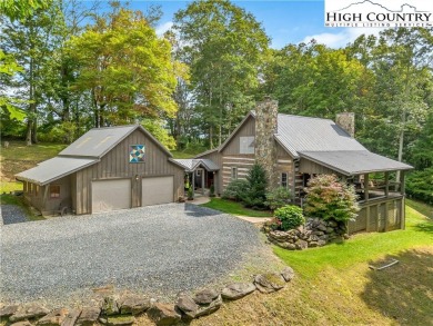 Welcome to your dream retreat. This charming log cabin is on Mountain Aire Golf Course in North Carolina - for sale on GolfHomes.com, golf home, golf lot