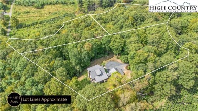 Welcome to your dream retreat. This charming log cabin is on Mountain Aire Golf Course in North Carolina - for sale on GolfHomes.com, golf home, golf lot