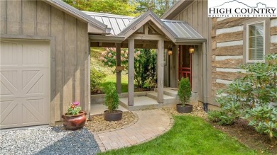 Welcome to your dream retreat. This charming log cabin is on Mountain Aire Golf Course in North Carolina - for sale on GolfHomes.com, golf home, golf lot