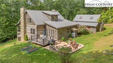 Welcome to your dream retreat. This charming log cabin is on Mountain Aire Golf Course in North Carolina - for sale on GolfHomes.com, golf home, golf lot