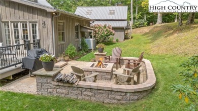 Welcome to your dream retreat. This charming log cabin is on Mountain Aire Golf Course in North Carolina - for sale on GolfHomes.com, golf home, golf lot