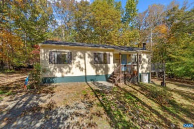 Welcome home to this Great Ranch with vaulted ceilings on Lake Monticello Golf Course in Virginia - for sale on GolfHomes.com, golf home, golf lot