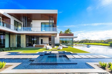 Step into unparalleled luxury in this brand-new custom estate on Jonathans Landing Golf Club in Florida - for sale on GolfHomes.com, golf home, golf lot