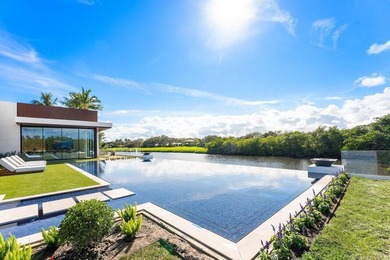 Step into unparalleled luxury in this brand-new custom estate on Jonathans Landing Golf Club in Florida - for sale on GolfHomes.com, golf home, golf lot