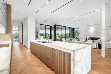 Step into unparalleled luxury in this brand-new custom estate on Jonathans Landing Golf Club in Florida - for sale on GolfHomes.com, golf home, golf lot