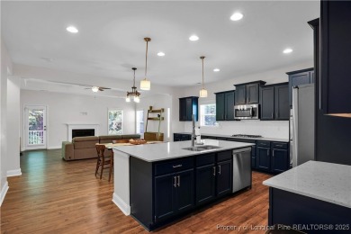 This beautiful home located in the private gated golf community on Anderson Creek Golf Club in North Carolina - for sale on GolfHomes.com, golf home, golf lot