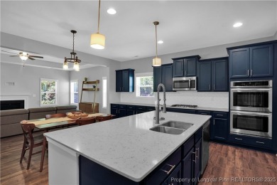 This beautiful home located in the private gated golf community on Anderson Creek Golf Club in North Carolina - for sale on GolfHomes.com, golf home, golf lot