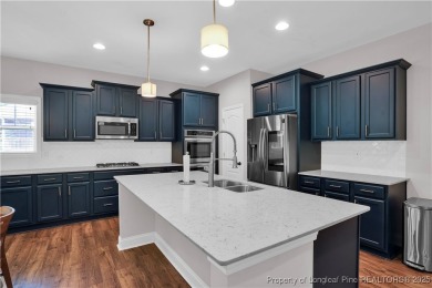 This beautiful home located in the private gated golf community on Anderson Creek Golf Club in North Carolina - for sale on GolfHomes.com, golf home, golf lot