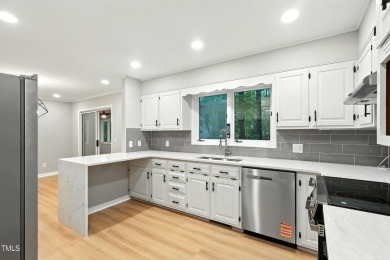 This beautifully updated ranch blends modern comfort with on Carolina Trace Country Club in North Carolina - for sale on GolfHomes.com, golf home, golf lot