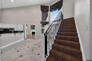 Nestled on a rare, sprawling one acre, corner lot overlooking on Hollytree Country Club in Texas - for sale on GolfHomes.com, golf home, golf lot