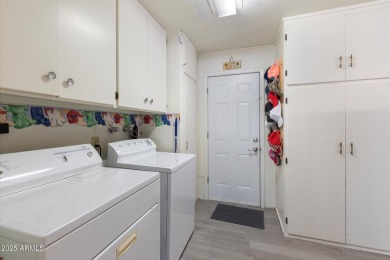 Experience the pinnacle of active adult living in this highly on Sun City Lakes West and East in Arizona - for sale on GolfHomes.com, golf home, golf lot