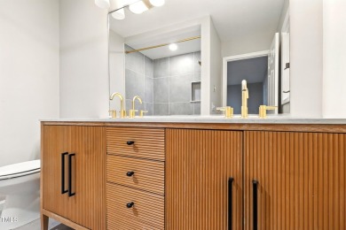 This beautifully updated ranch blends modern comfort with on Carolina Trace Country Club in North Carolina - for sale on GolfHomes.com, golf home, golf lot