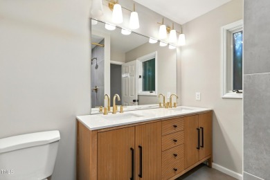 This beautifully updated ranch blends modern comfort with on Carolina Trace Country Club in North Carolina - for sale on GolfHomes.com, golf home, golf lot