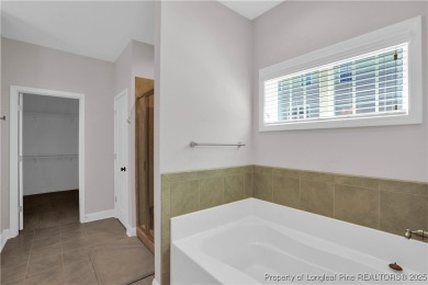 This beautiful home located in the private gated golf community on Anderson Creek Golf Club in North Carolina - for sale on GolfHomes.com, golf home, golf lot