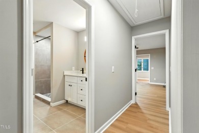 This beautifully updated ranch blends modern comfort with on Carolina Trace Country Club in North Carolina - for sale on GolfHomes.com, golf home, golf lot