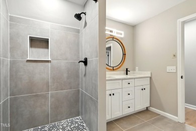 This beautifully updated ranch blends modern comfort with on Carolina Trace Country Club in North Carolina - for sale on GolfHomes.com, golf home, golf lot