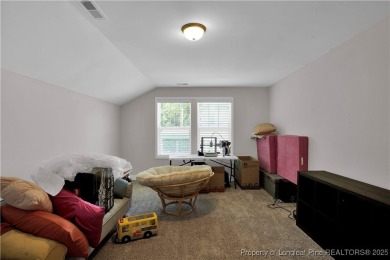 This beautiful home located in the private gated golf community on Anderson Creek Golf Club in North Carolina - for sale on GolfHomes.com, golf home, golf lot