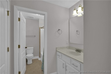 This beautiful home located in the private gated golf community on Anderson Creek Golf Club in North Carolina - for sale on GolfHomes.com, golf home, golf lot
