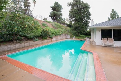 Welcome to this stunning one-story private pool home that backs on Canyon Crest Country Club in California - for sale on GolfHomes.com, golf home, golf lot