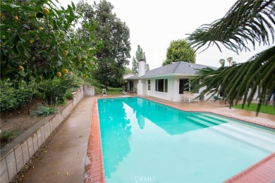 Welcome to this stunning one-story private pool home that backs on Canyon Crest Country Club in California - for sale on GolfHomes.com, golf home, golf lot