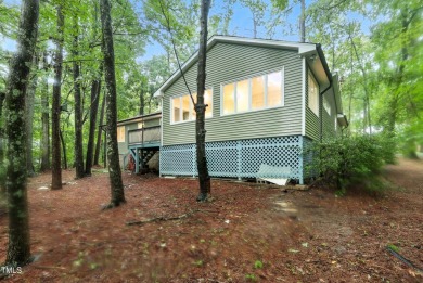 This beautifully updated ranch blends modern comfort with on Carolina Trace Country Club in North Carolina - for sale on GolfHomes.com, golf home, golf lot