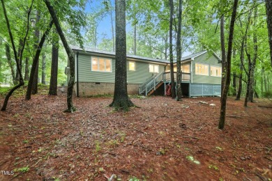 This beautifully updated ranch blends modern comfort with on Carolina Trace Country Club in North Carolina - for sale on GolfHomes.com, golf home, golf lot