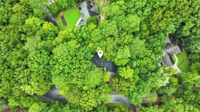 This beautifully updated ranch blends modern comfort with on Carolina Trace Country Club in North Carolina - for sale on GolfHomes.com, golf home, golf lot