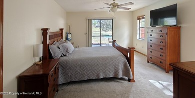 Nestled along the fairway of Hole 9 of the prestigious Oak Hills on Oak Hills Country Club in Florida - for sale on GolfHomes.com, golf home, golf lot