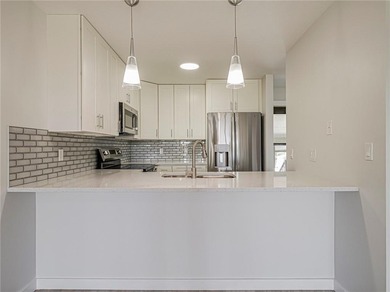 Scenic golf course views, completely remodeled. NEW: ceiling on Vista Plantation Golf Club in Florida - for sale on GolfHomes.com, golf home, golf lot