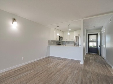 Scenic golf course views, completely remodeled. NEW: ceiling on Vista Plantation Golf Club in Florida - for sale on GolfHomes.com, golf home, golf lot