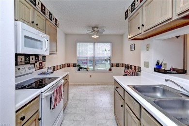 Two primary bedrooms with full bath are featured in this outside on Kiln Creek Golf and Country Club in Virginia - for sale on GolfHomes.com, golf home, golf lot