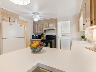 Welcome to easy Florida living in the fun & vibrant Barefoot Bay on Barefoot Bay Golf Course in Florida - for sale on GolfHomes.com, golf home, golf lot