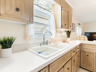 Welcome to easy Florida living in the fun & vibrant Barefoot Bay on Barefoot Bay Golf Course in Florida - for sale on GolfHomes.com, golf home, golf lot