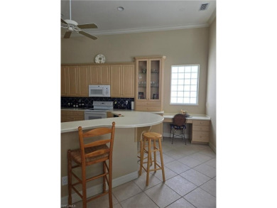Enter through a private entrance to a peacefully courtyard with on Kensington Golf and Country Club in Florida - for sale on GolfHomes.com, golf home, golf lot