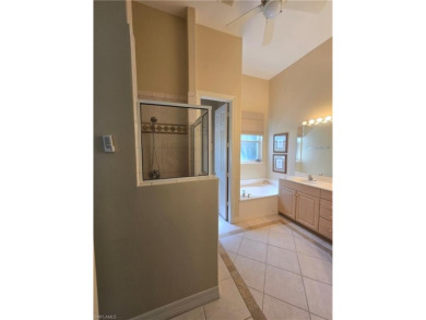 Enter through a private entrance to a peacefully courtyard with on Kensington Golf and Country Club in Florida - for sale on GolfHomes.com, golf home, golf lot