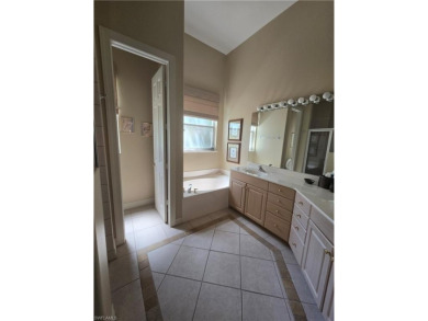 Enter through a private entrance to a peacefully courtyard with on Kensington Golf and Country Club in Florida - for sale on GolfHomes.com, golf home, golf lot