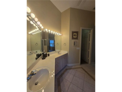 Enter through a private entrance to a peacefully courtyard with on Kensington Golf and Country Club in Florida - for sale on GolfHomes.com, golf home, golf lot