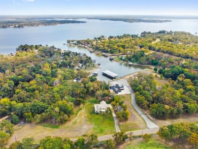 Discover unparalleled lakeside luxury at 5230 Esquire Estates Rd on Pinnacle Golf and Boat Club in Texas - for sale on GolfHomes.com, golf home, golf lot